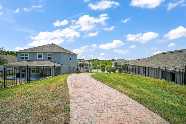 1155 Dora Parc Ln, Mount Dora, FL 32757 - view of yard featuring decorative driveway and a residential view