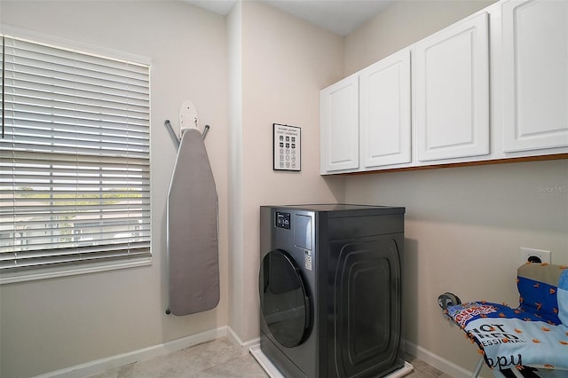 1155 Dora Parc Ln, Mount Dora, FL 32757 - laundry area with cabinet space and baseboards