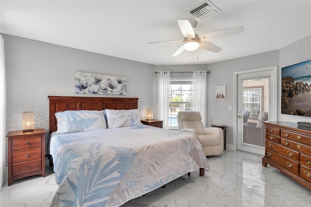 5400 Saddleback Ct, Lady Lake, FL 32159 - bedroom with light marble finish flooring and a ceiling fan