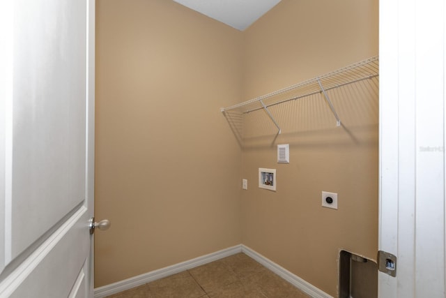 3194 Bayou Ln, Tavares, FL 32778 - clothes washing area with hookup for a washing machine, hookup for an electric dryer, baseboards, and tile patterned floors