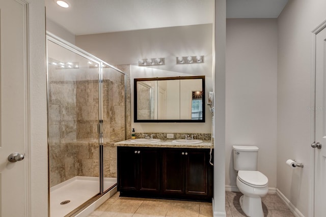 3194 Bayou Ln, Tavares, FL 32778 - full bathroom featuring a shower stall, tile patterned flooring, toilet, and double vanity