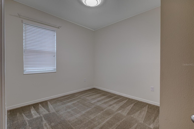 3194 Bayou Ln, Tavares, FL 32778 - carpeted empty room with plenty of natural light and baseboards