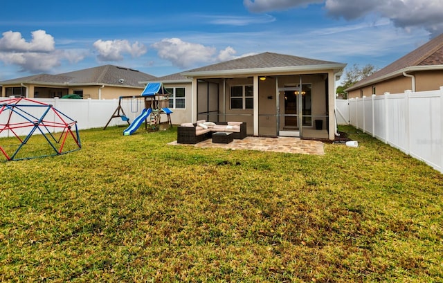 3194 Bayou Ln, Tavares, FL 32778 - back of house featuring a playground, a sunroom, and outdoor lounge area