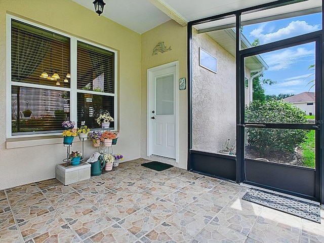 view of unfurnished sunroom