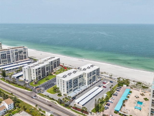 aerial view of extended coastline and apartment complex