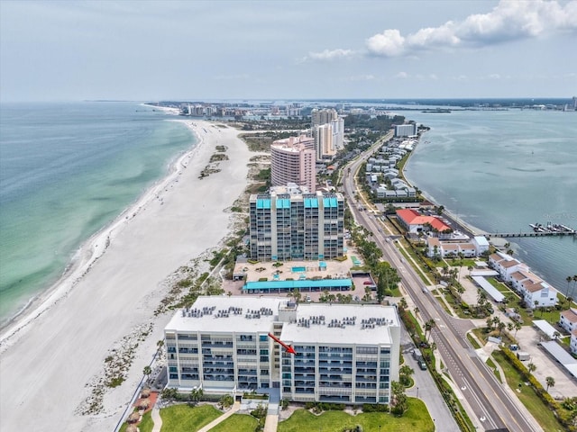 view of urban area featuring expansive beach