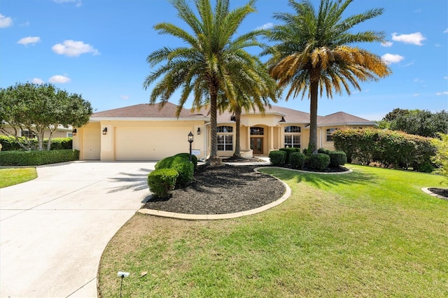 1123 Barnacle Ter, The Villages, FL 32162 - ranch-style house featuring an attached garage, stucco siding, concrete driveway, and a front yard