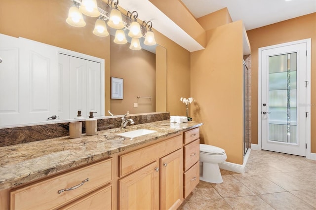 1123 Barnacle Ter, The Villages, FL 32162 - full bathroom featuring toilet, a stall shower, vanity, and baseboards
