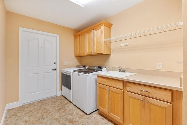 1123 Barnacle Ter, The Villages, FL 32162 - washroom featuring independent washer and dryer, cabinet space, and baseboards