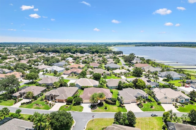1123 Barnacle Ter, The Villages, FL 32162 - aerial perspective of suburban area with a nearby body of water