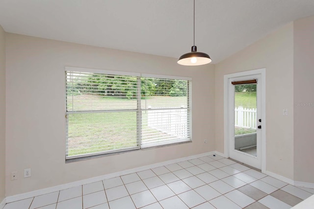 11442 Beggs Ct, Clermont, FL 34711 - unfurnished room with lofted ceiling, baseboards, and light tile patterned floors
