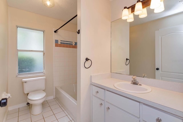 11442 Beggs Ct, Clermont, FL 34711 - full bath featuring tile patterned floors, toilet, vanity, baseboards, and bathing tub / shower combination
