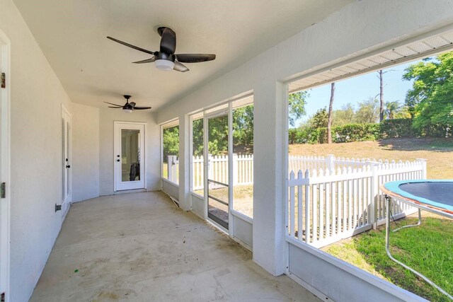 11442 Beggs Ct, Clermont, FL 34711 - unfurnished sunroom with ceiling fan