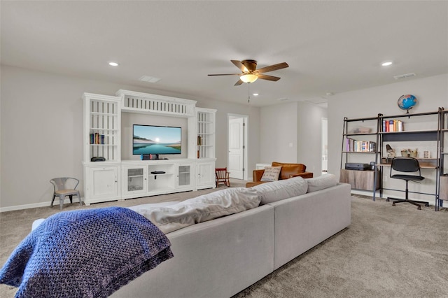 carpeted living room featuring ceiling fan, recessed lighting, and baseboards