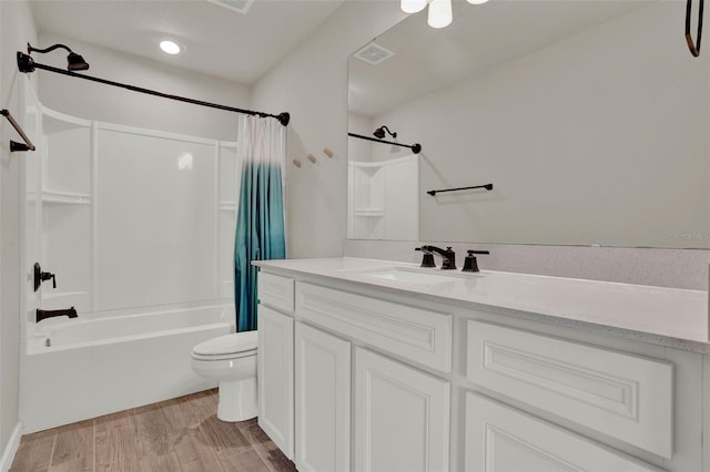 bathroom with toilet, shower / bathtub combination with curtain, vanity, and wood finished floors