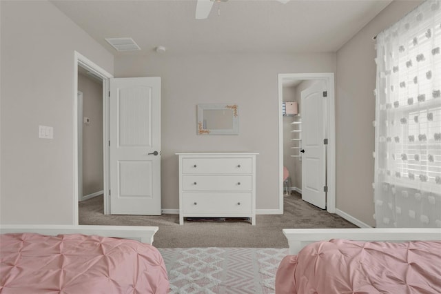 bedroom featuring carpet, baseboards, and a ceiling fan