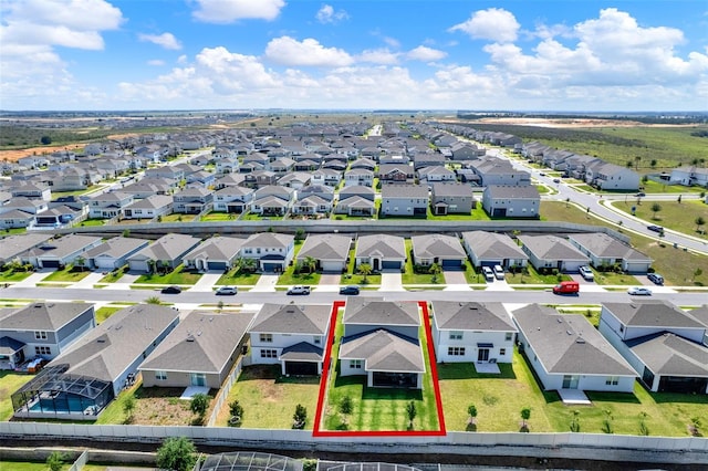 aerial view of residential area featuring property boundaries highlighted