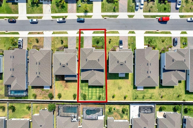 aerial perspective of suburban area featuring property parcel outlined