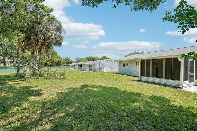 11214 SW 77th Ct, Ocala, FL 34476 - view of yard featuring a sunroom