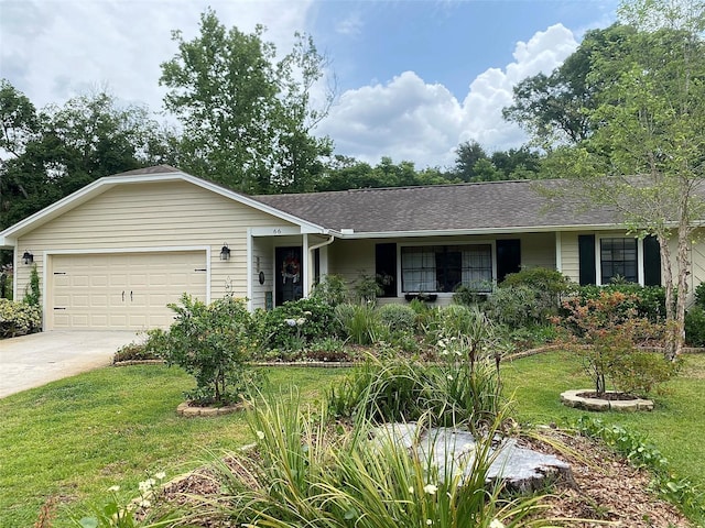 ranch-style house featuring an attached garage, a front yard, driveway, and roof with shingles