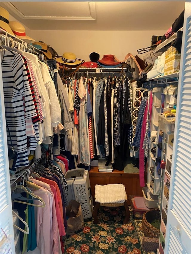 spacious closet with attic access