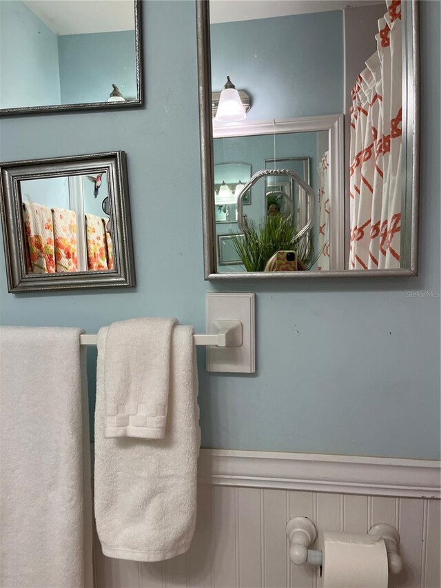 66 Elmwood Trl, Deland, FL 32724 - bathroom featuring wainscoting