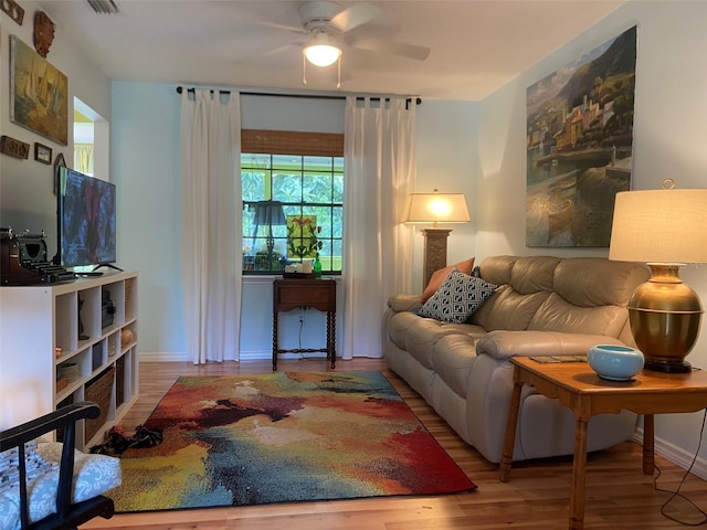 66 Elmwood Trl, Deland, FL 32724 - living area featuring ceiling fan, wood finished floors, and baseboards