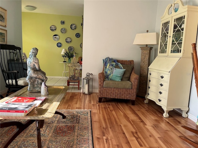 66 Elmwood Trl, Deland, FL 32724 - sitting room with wood finished floors and baseboards