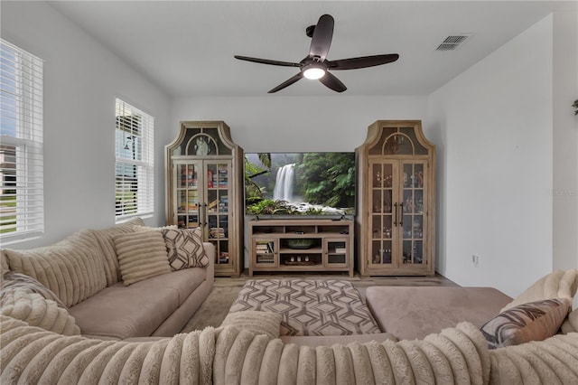 2552 Chickasaw Plum Loop, Clermont, FL 34711 - living area featuring a ceiling fan