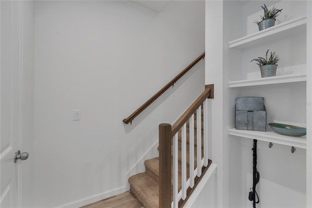 2552 Chickasaw Plum Loop, Clermont, FL 34711 - stairway featuring wood finished floors