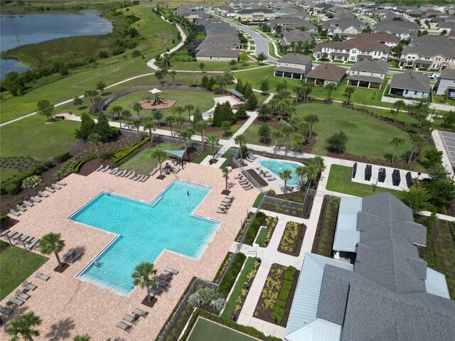 2552 Chickasaw Plum Loop, Clermont, FL 34711 - bird's eye view of a pool and a nearby body of water
