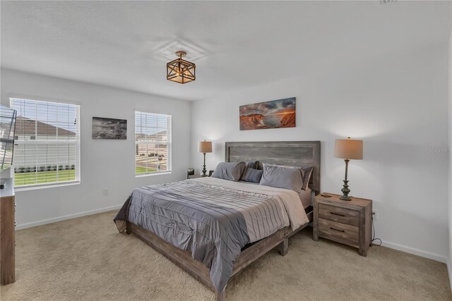 2552 Chickasaw Plum Loop, Clermont, FL 34711 - carpeted bedroom with baseboards