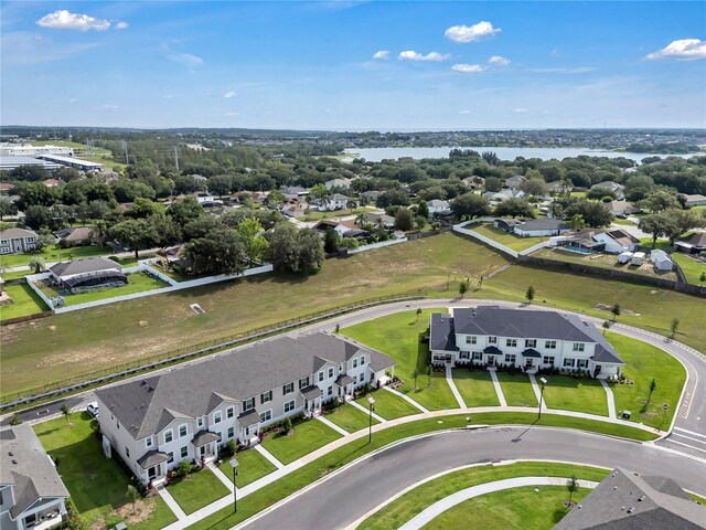 2552 Chickasaw Plum Loop, Clermont, FL 34711 - aerial perspective of suburban area with a large body of water
