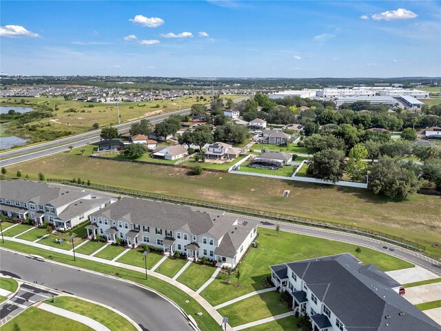2552 Chickasaw Plum Loop, Clermont, FL 34711 - aerial perspective of suburban area with a nearby body of water