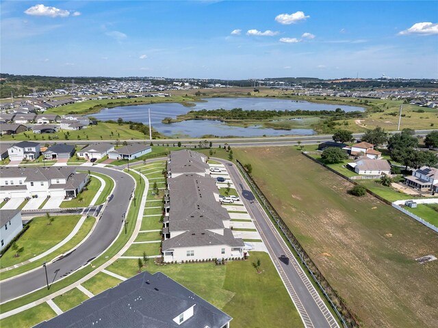 2552 Chickasaw Plum Loop, Clermont, FL 34711 - aerial perspective of suburban area with a nearby body of water