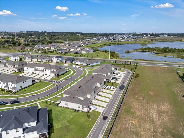 2552 Chickasaw Plum Loop, Clermont, FL 34711 - aerial perspective of suburban area with a nearby body of water