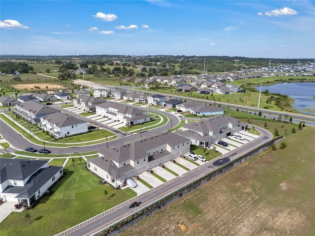 2552 Chickasaw Plum Loop, Clermont, FL 34711 - aerial view of property's location featuring a nearby body of water and nearby suburban area