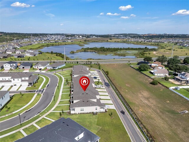 2552 Chickasaw Plum Loop, Clermont, FL 34711 - aerial perspective of suburban area with a nearby body of water