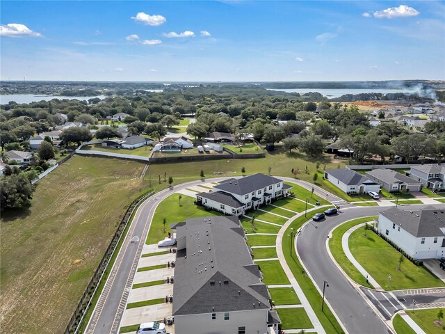 2552 Chickasaw Plum Loop, Clermont, FL 34711 - aerial view of residential area featuring a nearby body of water