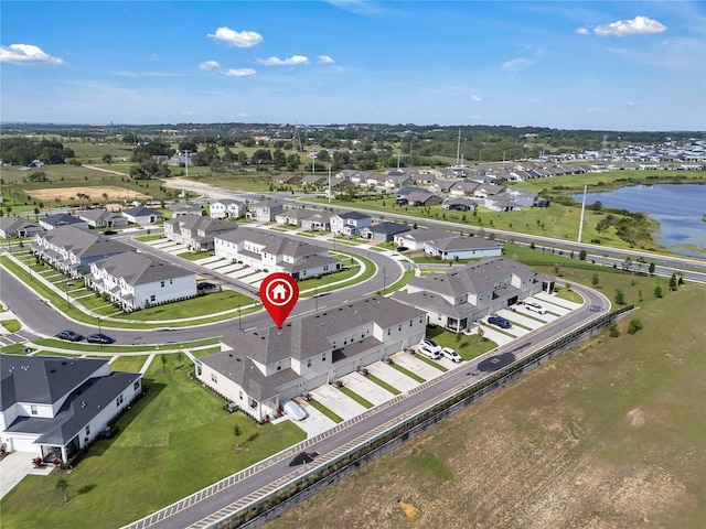 2552 Chickasaw Plum Loop, Clermont, FL 34711 - aerial overview of property's location with a large body of water and nearby suburban area