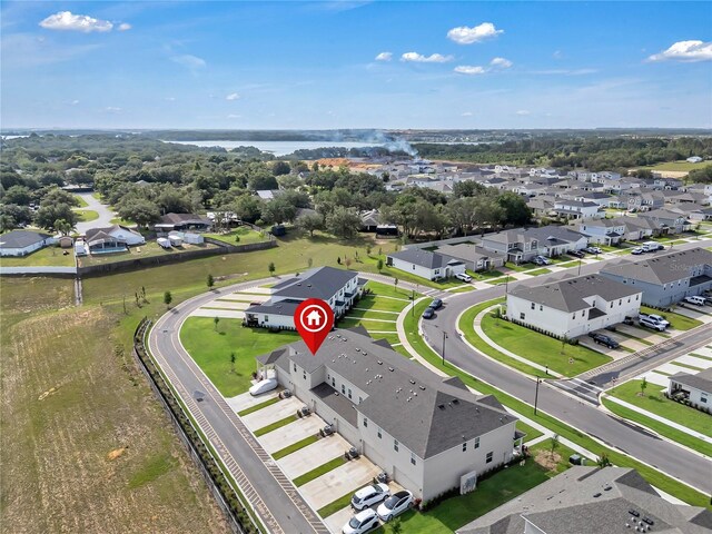 2552 Chickasaw Plum Loop, Clermont, FL 34711 - aerial view of residential area with a large body of water