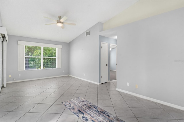 26608 Racquet Cir, Leesburg, FL 34748 - unfurnished room with ceiling fan, lofted ceiling, tile patterned flooring, and baseboards