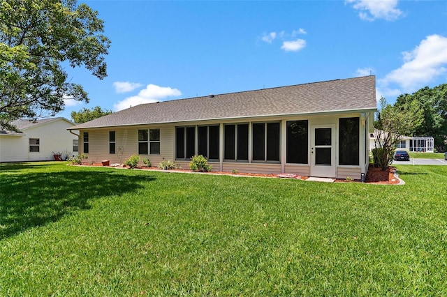 26608 Racquet Cir, Leesburg, FL 34748 - back of house with a yard and a shingled roof