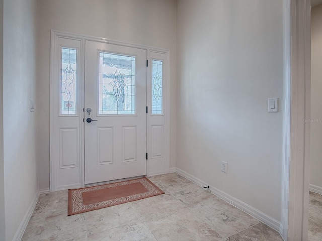 3136 Vandenberg Ct, The Villages, FL 32163 - entryway featuring baseboards