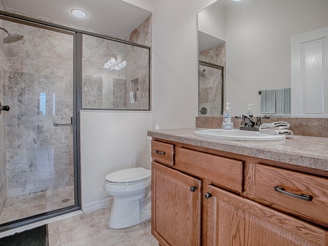 3136 Vandenberg Ct, The Villages, FL 32163 - bathroom featuring a shower stall, toilet, and vanity