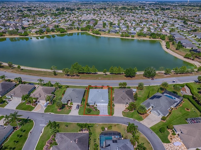 3136 Vandenberg Ct, The Villages, FL 32163 - aerial overview of property's location with nearby suburban area and a large body of water