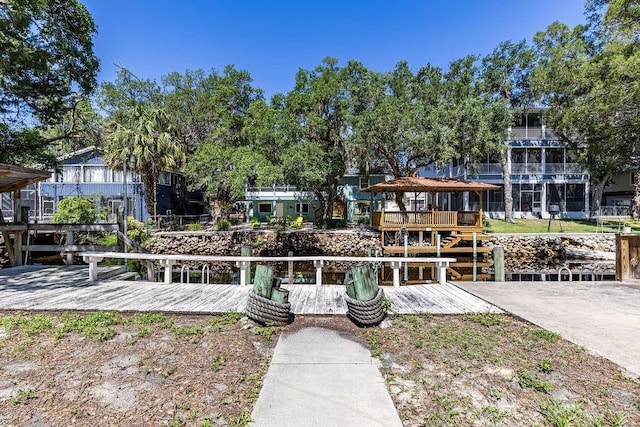 view of front of house with a boat dock