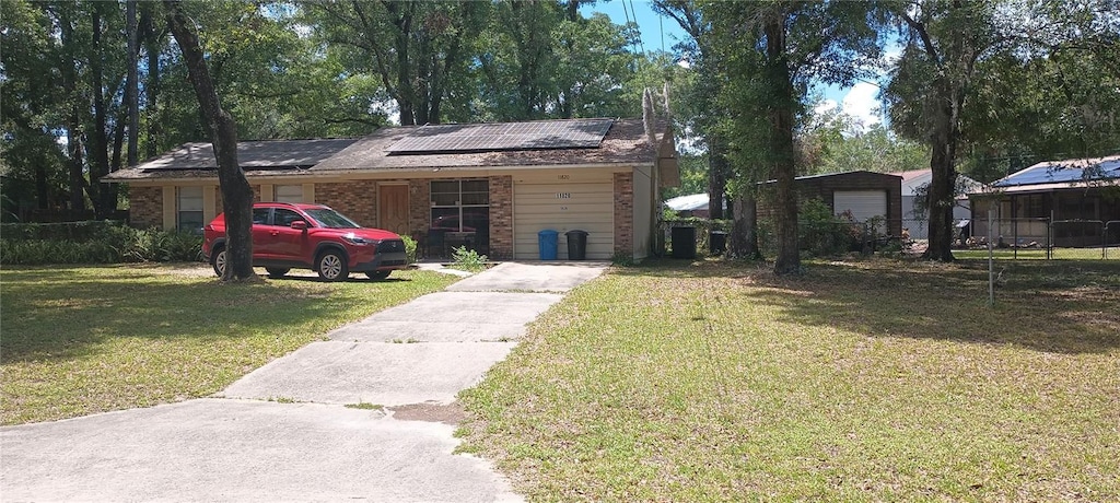11820 N Par Ter, Dunnellon, FL 34434 - view of grassy yard with driveway