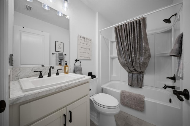 4451 Elijah Loop, The Villages, FL 32163 - bathroom featuring vanity, shower / bath combination with curtain, and toilet