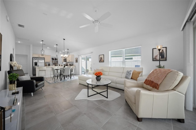 4451 Elijah Loop, The Villages, FL 32163 - living room with lofted ceiling and a ceiling fan